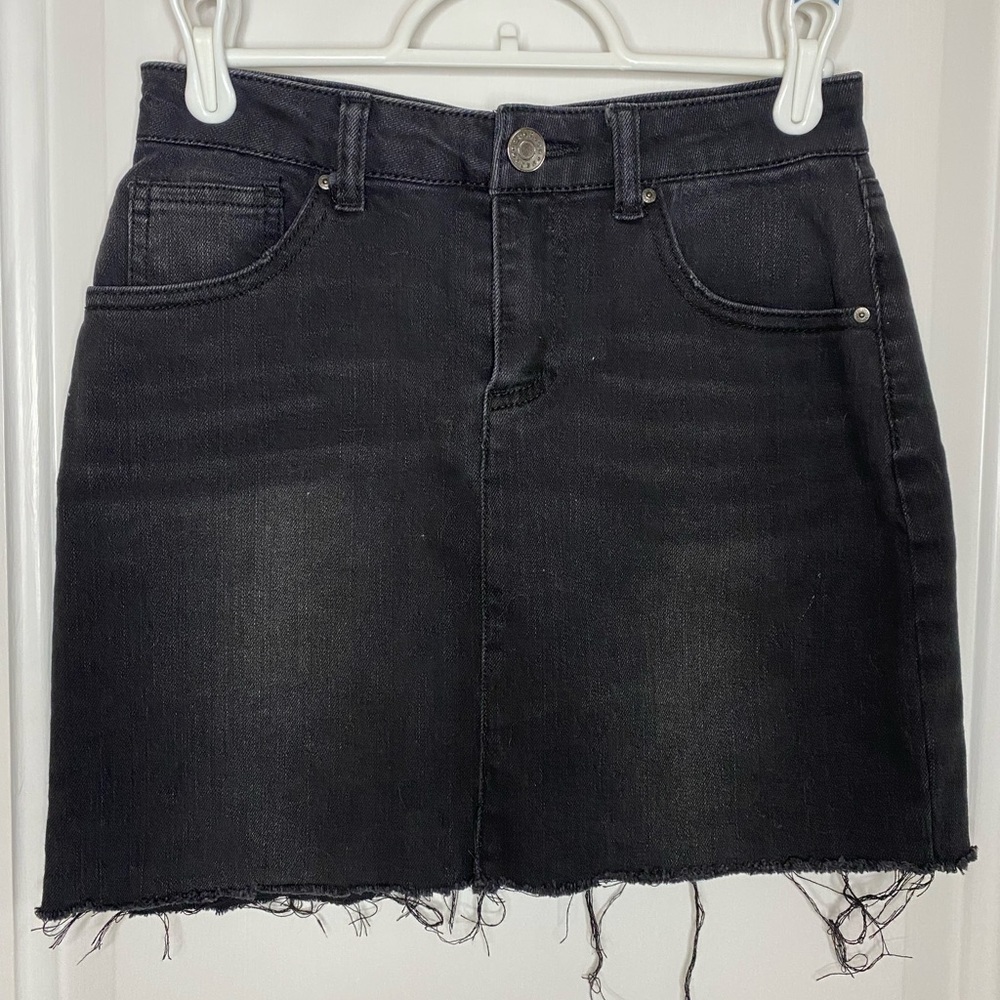 Black jean skirt, no rips, distressed bottom! Barely warm, great condition!